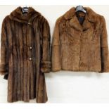 A ladies fur coat, three quarter length and another.