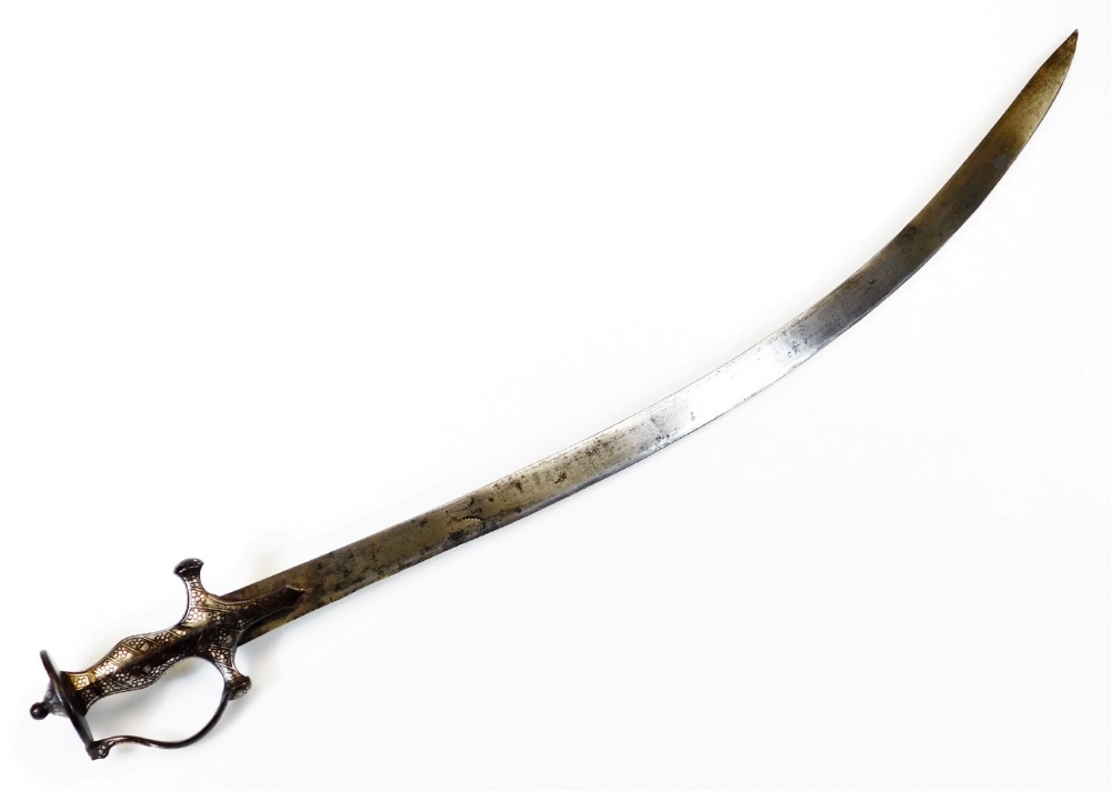 An Indian Tulwar sword, with plain curved blade, shaped ear handle, shaped grip and compressed - Image 4 of 5