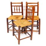 Three 19thC elm rush seated side chairs, with horizontal and cylindrical vertical backs and turned