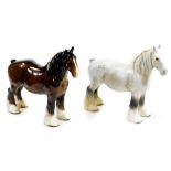 A 20thC Beswick shire horse in grey colour way, 22cm high, and another in brown. (2, AF)
