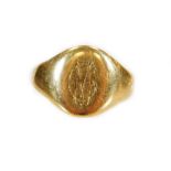 An 18ct gold signet ring, the head initialled MC, clipped, 5.3g.