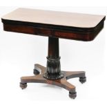 An early 19thC rosewood card table, the rounded top raised on a heavy gun barrel and floral