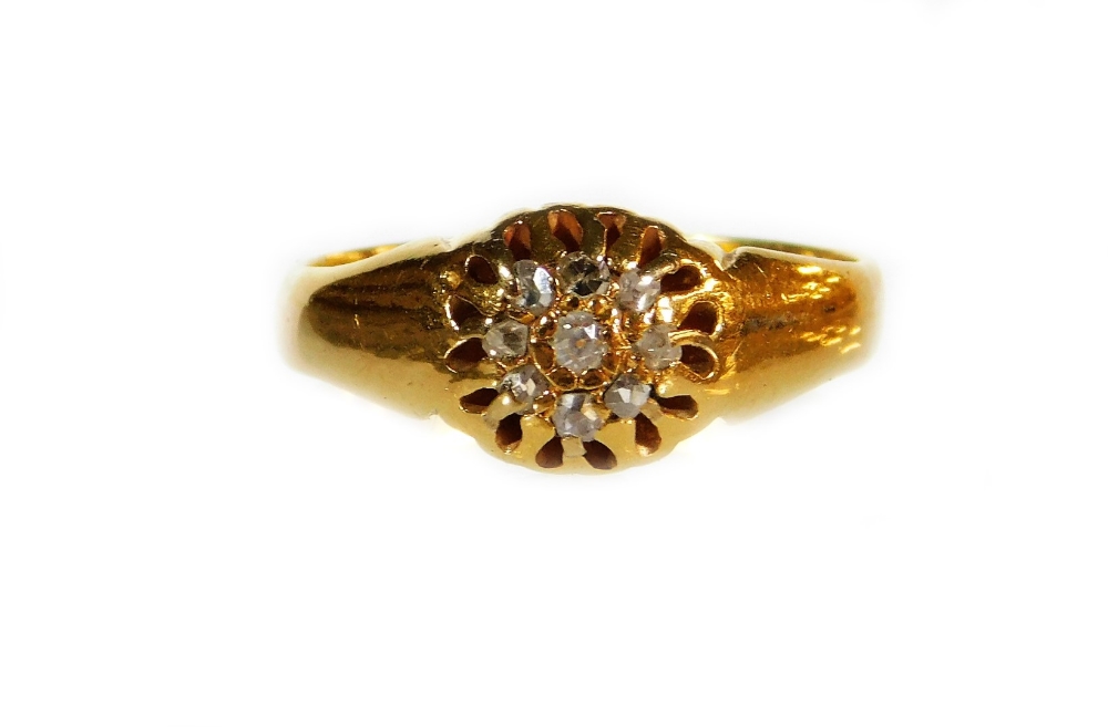 A dress ring, set with small diamonds, size O.