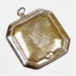 A small silver compact pendant, bearing inscription to front, with single mirror to lift up lid,