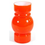 A 20thC Studio glass vase, in orange, of bellied circular form, with polished pontil, 26cm high.