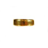 A 22ct gold wedding band, of plain circular form, size O, 4.3g.