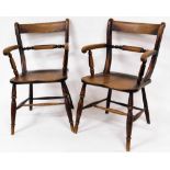 A pair of 19thC Lincolnshire ash and elm carver chairs, with horizontal splats, shaped arms,