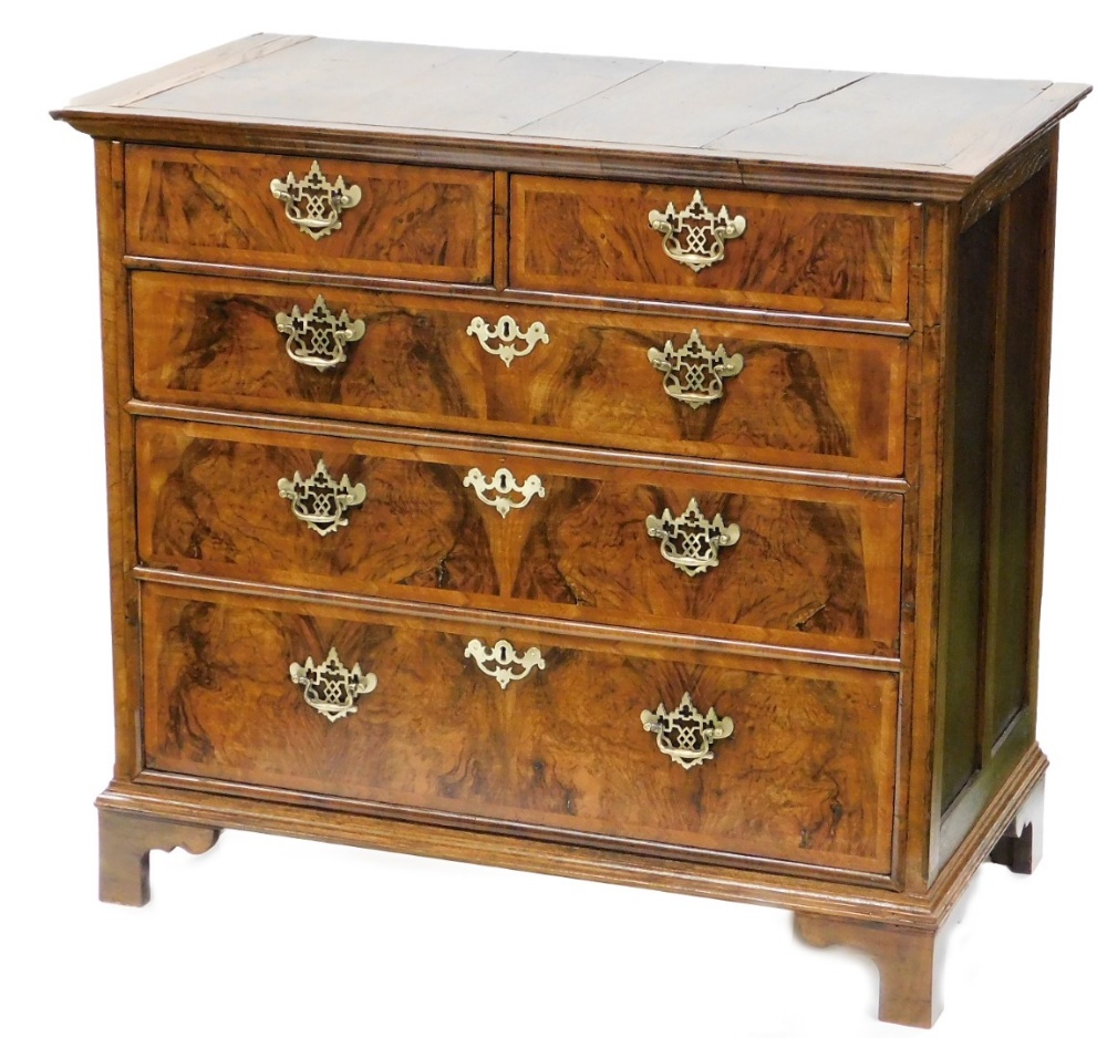 A principally 18thC walnut and oak chest, of two short and three long drawers, each with pierced