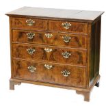 A principally 18thC walnut and oak chest, of two short and three long drawers, each with pierced