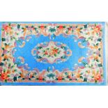 A Chinese blue patterned rug, in floral pattern, 160cm x 91cm.