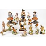 Various Goebel figures, Little Hiker 16cm high, similar figures, a Sherratt & Simpson dog figure,