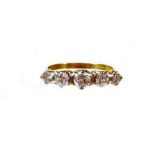 An 18ct gold five stone diamond ring, set with five graduated round brilliant cut diamonds, in a