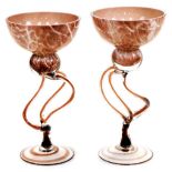 A pair of glass vases, each with bowl shaped bodies and entwined stems, 22cm high. (2)