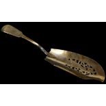 A George III silver fish slice, fiddle pattern with pierced fish blade, partially bright cut, London