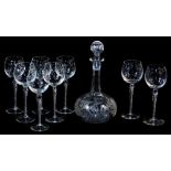 A 20thC drinks set, comprising decanter, 29cm high, and eight hock glasses, each with a repeat