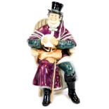 A Royal Doulton figure The Coachman HN2242, printed marks beneath, 20cm high.