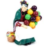 A Royal Doulton figure The Old Balloon Seller HN1315, printed marks beneath, 20cm high.