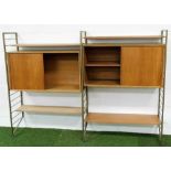 A 1960's teak and metal framed Ladderax open cabinet, with various shelves, open sections and