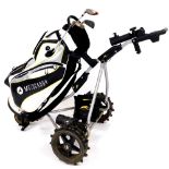 A Motocaddy golf bag, an electric PowaKaddy trolley 96cm high, a Ping putter, Taylor Made super