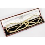A multi strand pearl necklace, the clasp marked 925, of graduated form, 21cm wide, in Bell
