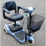 A Free Rider mobility scooter, with folding seat, battery charger and key, 90cm high.