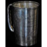 A George V silver mug, with tapering cylindrical body, C scroll handle, engraved Northshore Golf