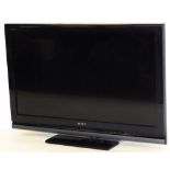 A Sony Bravia 41 inch colour television, in black trim with wire.