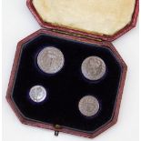 An Edwardian cased set of Maundy money, dated 1905, four pence, three pence, 4d, 3d, 2d and 1d, in