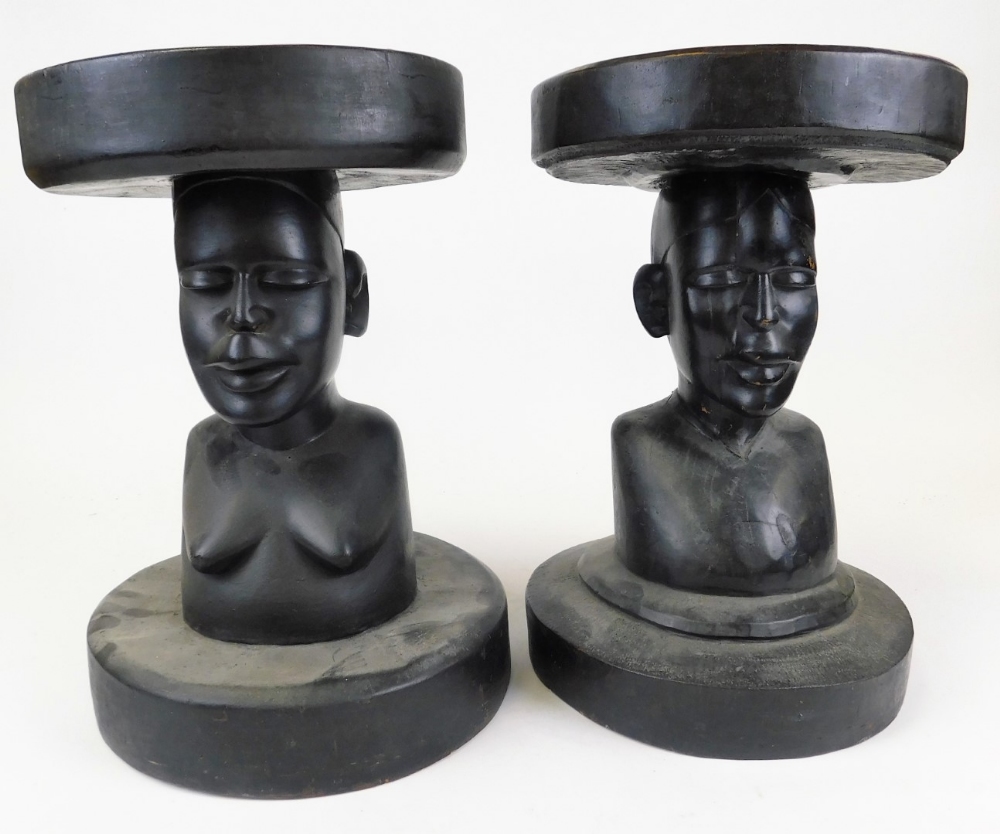 An African tribal stand, with plain circular top, nude quarter length figure stem and plain circular