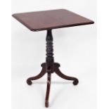 A Victorian mahogany tilt-top table, on turned stem terminating in scroll feet, when raised 110cm