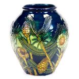 A Moorcroft pottery vase, decorated with fern, WM mark no. 229, 23cm high.(boxed)