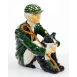A V Firth Isle of Man shepherd and collie group, marked beneath, 12cm high.