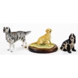 A Border Fine Arts cocker spaniel figure B0015A, 12cm high, a further labrador, and another of