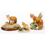 A Kowa porcelain red fox figure group, others, Border Fine Arts fox and another unmarked, on