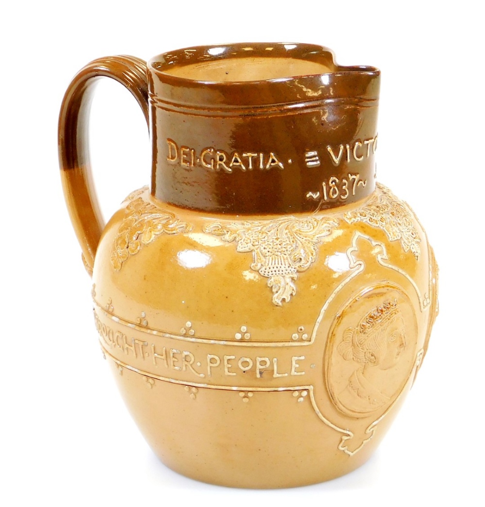 A Royal Doulton Queen Victoria Jubilee stoneware jug, in two colours raised with medallions of the