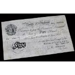 A 1955 Bank of England white five pound note, L K O'Brien, Z91092147, 21cm wide.