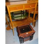 A side table, teak coffee table and a nest of three tables, 50cm high.