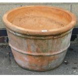 A large planter, of tapering circular form, 63cm diameter.