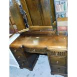 An oak mirror back dressing table, with inverted front.