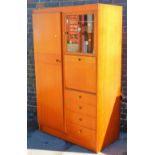 A compactum single wardrobe, with fall front, four drawers and glazed cupboard, 108cm wide.