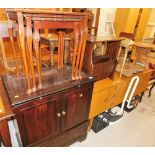 A mahogany finish television cabinet, nest of three tables, 65cm wide, mahogany magazine rack,