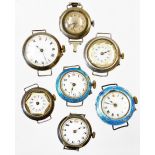 Seven various trench watch heads, continental, enamel finish, various others, with Arabic