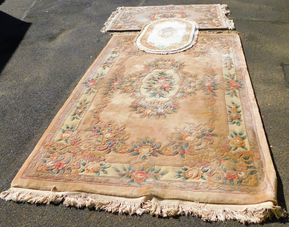 Various Chinese rugs.