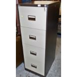 A Triumph four drawer metal filing cabinet with key, 134cm high.