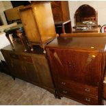 An oak television cabinet, 95cm wide, circular glass top coffee table, pedestal cabinet and a
