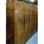 A walnut two door wardrobe, 86cm wide and an oak finish wardrobe.