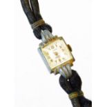 A Bonheur Ancre seventeen jewel Swiss wristwatch, with rope work strap.