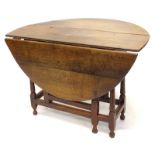 An 18thC oak oval gateleg table, on turned supports, 110cm wide. Provenance: The Estate of Miss