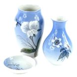 Three items of Royal Copenhagen porcelain, to include a vase decorated with a white flower, 15cm,