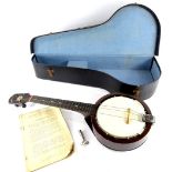 A Keech banjolele or ukulele banjo, in carrying case.